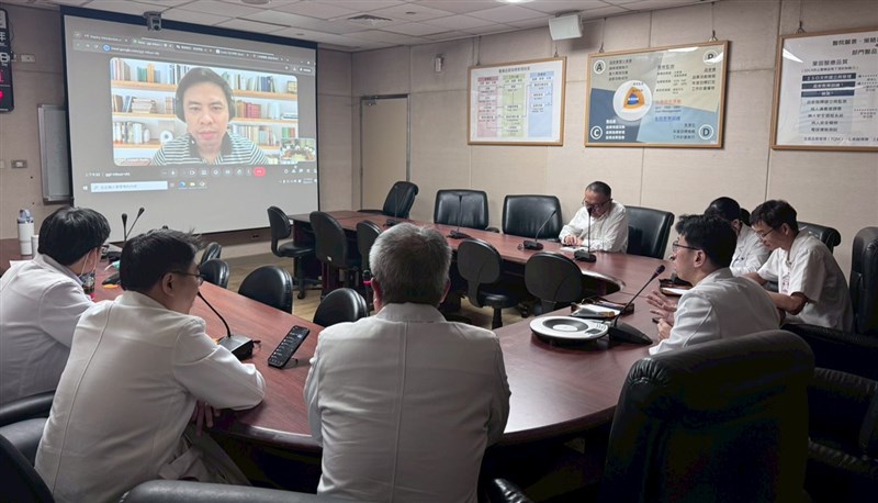 Mark Joseph Radin appears on screen during an online meeting with medical staff at Tri-Service General Hospital (TSGH) before Wendilyn Santoalla undergoes a DPS implantation surgery in early March. Photo courtesy of TSGH April 3, 2026