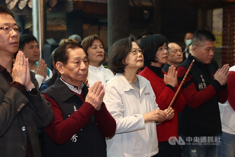 Former President Tsai Ing-wen (third left) holds a joss stick in observation of traditional rites in this CNA file photo for illustrative purposes
