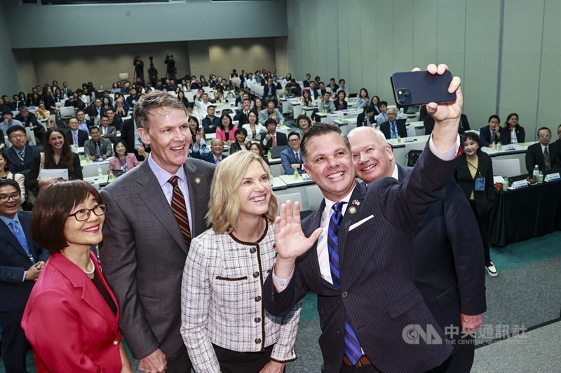 United States Representative Zach Nunn (second from right) poses with other attendees at a forum in Taipei on Tuesday. CNA photo April 7, 2026