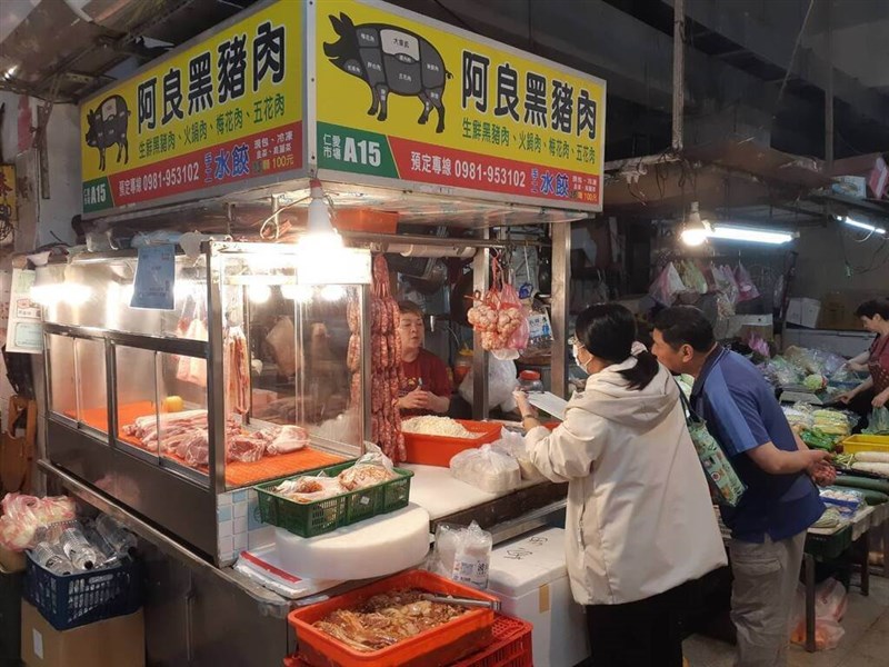 Fresh cuts of pork are displayed at a market stall. CNA file photo
