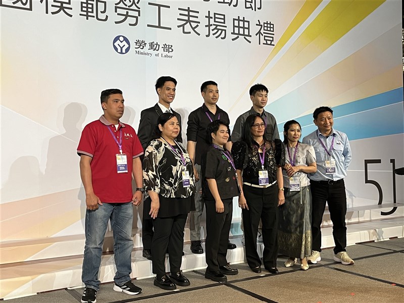 Nine of the 10 migrant workers honored this year attend the National Model Worker Award ceremony in person in Taipei on Wednesday. CNA photo April 29, 2026