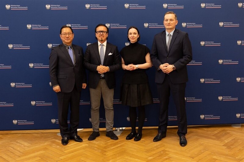 From left, Hon Hai's chief strategy officer for EV operations Jun Seki, Polish Minister of State Assets Wojciech Balczun, Secretary of State at Poland's Ministry of State Assets Eliza Zeidler, and EMP CEO Cyprian Gronkiewicz. Photo courtesy of Hon Hai May 7, 2026
