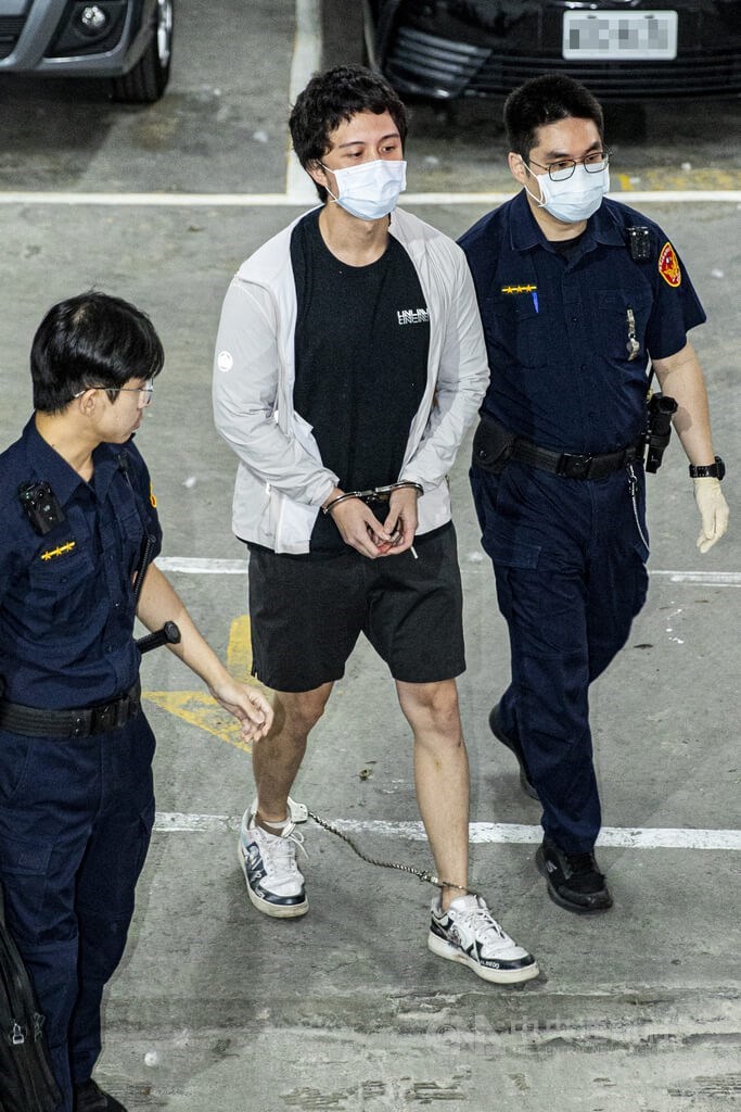Sun An-tso (center) is escorted by police officers on Sunday. CNA photo May 17, 2026