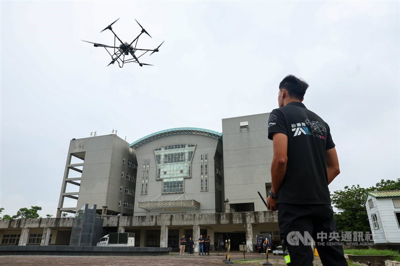 A 7A Drones employee flies a drone engineered by his company at the Asia UAV AI Innovation Application R&D Center in Chiayi County on Sunday. CNA photo May 17, 2026