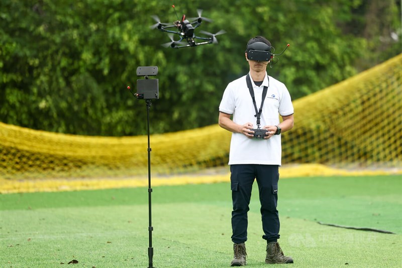 A Thunder Tiger engineer tests out a drone made by his company at the Asia UAV AI Innovation Application R&D Center in Chiayi County on Sunday. CNA photo May 17, 2026