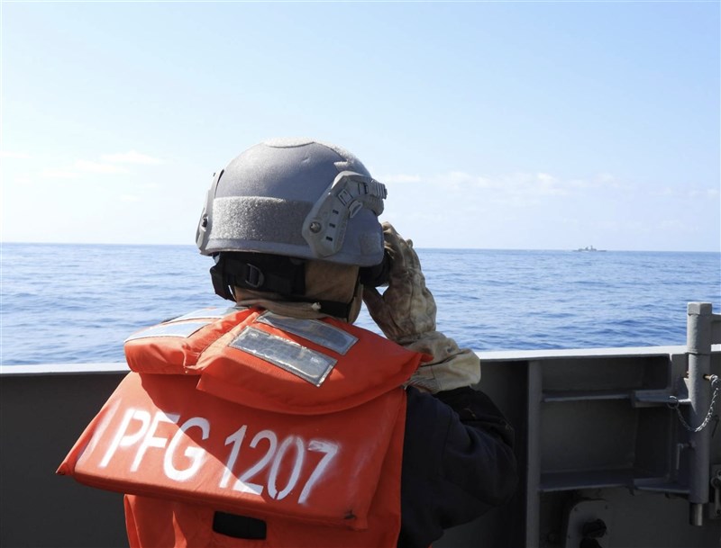 A Taiwanese Navy crew monitors China's "Xuzhou" Type 054A frigate from aboard the "Wu Chang" Kang Ding-class frigate. Photo courtesy of the Ministry of National Defense May 19, 2026