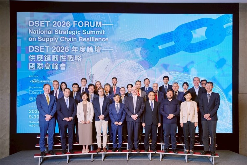 American Institute in Taiwan Director Raymond Greene (front fifth right) and other government officials take a group photo in a forum in Taipei on Saturday. Photo courtesy of DSET