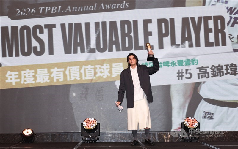 Taiwan basketball player Gao Jin-wei holds the regular-season MVP trophy on stage during the ceremony in Taipei on Wednesday. CNA photo June 10, 2026