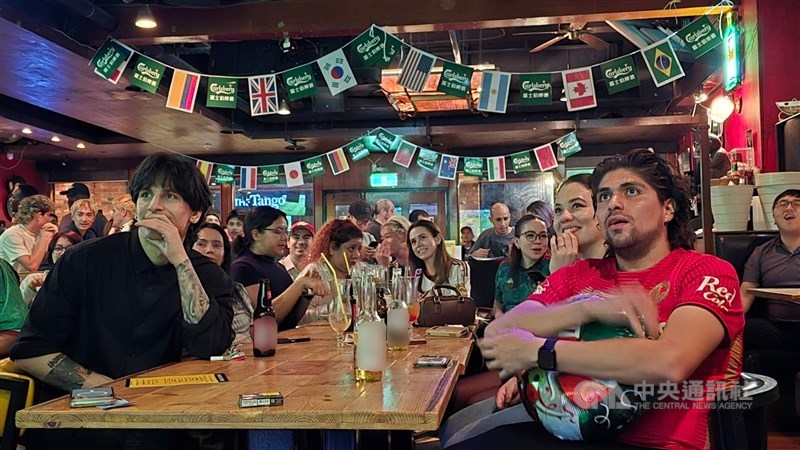 People gather at a bar to watch the opening match of the 2026 FIFA World Cup in Taipei early Friday. CNA photo June 12, 2026