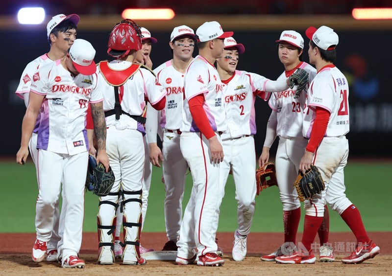 Members of Wei Chuan Dragons celebrate their win on Sunday. CNA photo July 6, 2026