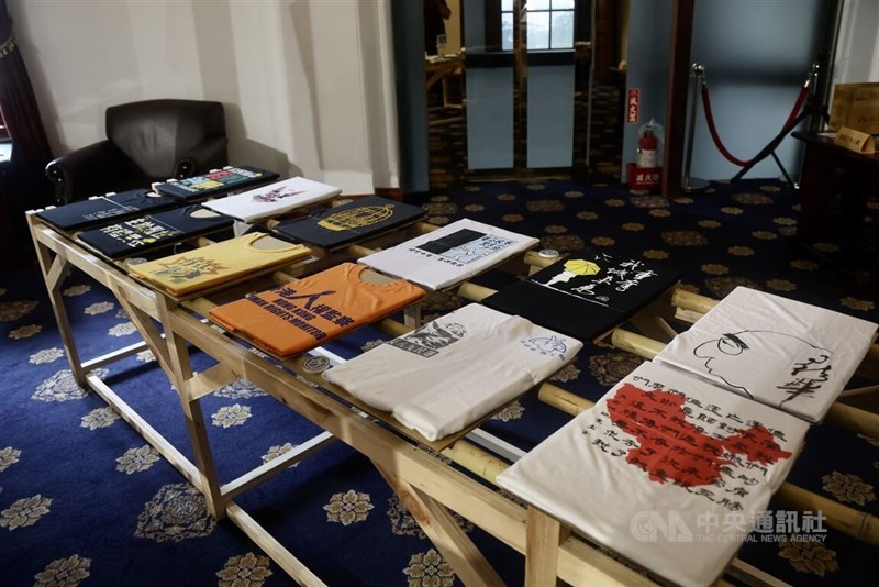 T-shirts from past Hong Kong public events and democratic movements are displayed at the Taipei 228 Memorial Museum on Sunday. CNA photo July 5, 2026