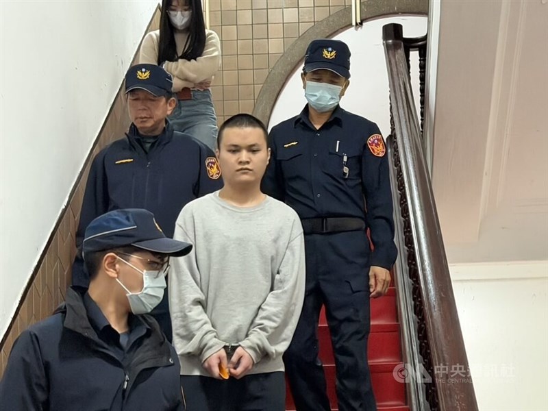 Chang (in grey), the man sentenced to death for killing his wife, mother-in-law and stepson. CNA file photo