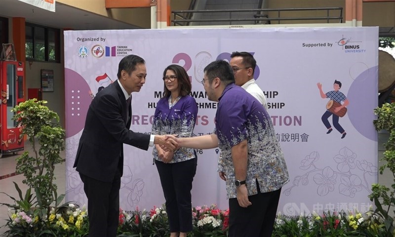 Taiwan's representative to Indonesia, Bruce Hung (left) shakes hands with a BINUS University representative. CNA file photo July 11, 2026
