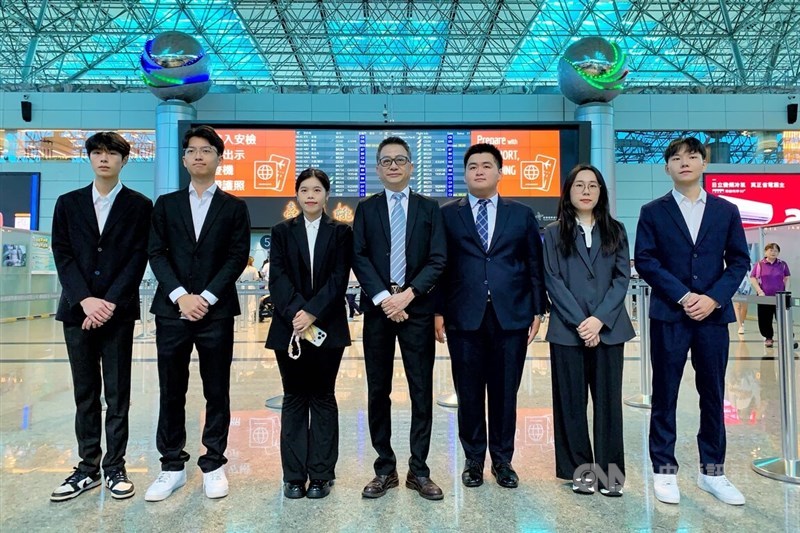 Taiwan People's Party Central Review Committee Chairman Lee Wei-hwa (fourth left) and delegation members pose at Taiwan Taoyuan International Airport on Tuesday before departing for a four-day visit to Shanghai. CNA photo July 14, 2026