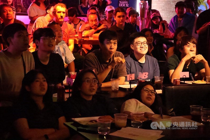A group of football fans in Taipei closely watch the World Cup Final early Monday morning. CNA photo July 20, 2026