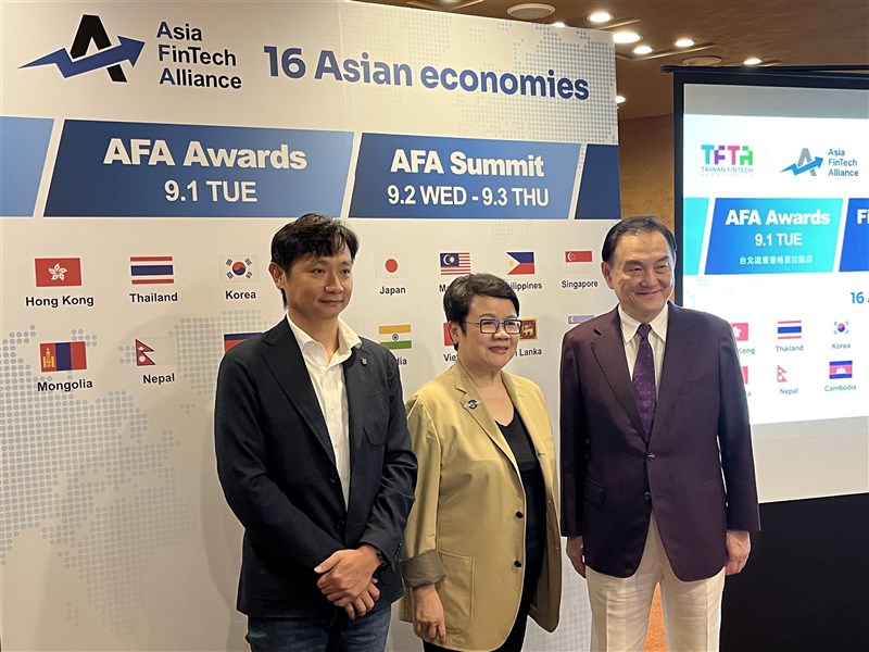 AFA Secretary Winston Hsiao (left), AFA Chairwoman Jaclyn Tsai (center) and Etron Technology Chairman Nicky Lu (right) pose for a photo during a media briefing in Taipei on Tuesday. CNA photo Aug. 11, 2026