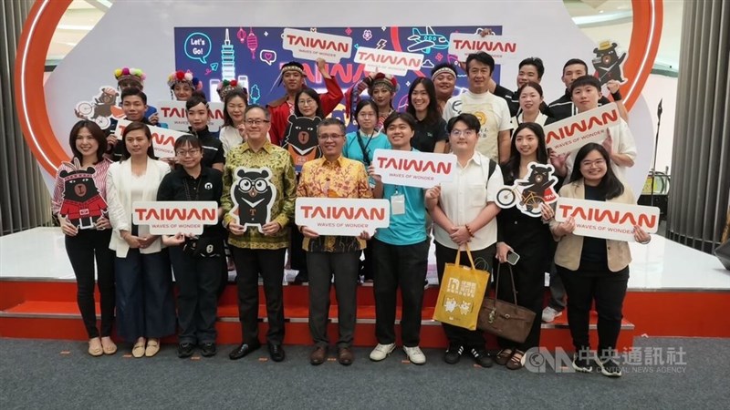 Chou Shih-pi (front center), director of the Taiwan Tourism Information Center in Jakarta, and other officials pose for a photo at the opening of the Taiwan tourism expo in Jakarta on Friday. CNA photo Aug. 15, 2026