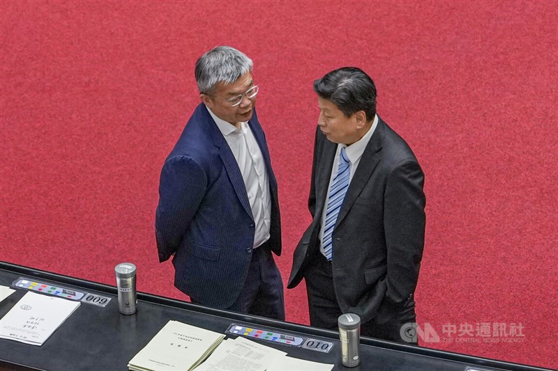 Democratic Progressive Party legislative caucus leader Tsai Chi-chang (left) and Kuomintang legislative caucus leader Fu Kun-chi speak inside the Legislative Yuan during deliberations on the 2026 central government budget in Taipei on Friday. CNA photo Aug. 14, 2026