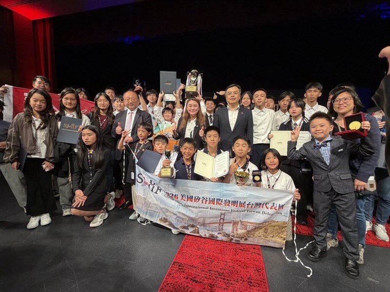 Taiwanese participants pose on stage with trophies and certificates at the Silicon Valley International Inventions Festival in Santa Clara, California on Sunday. Photo courtesy of Taiwan Invention Association