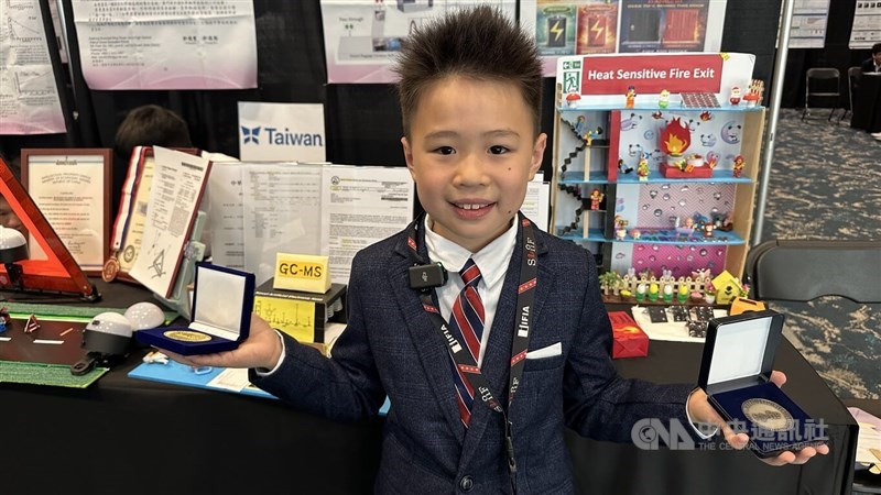 Kang Chiao International School student Hsu Ting-wei, 10, poses for a photo with his medals at the Silicon Valley International Inventions Festival in Santa Clara, California, on Saturday. CNA photo Aug. 16, 2026