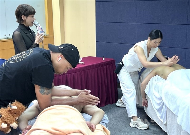 Members of TERA demonstrate sports recovery massage techniques to promote the upcoming TERO in this CNA file photo