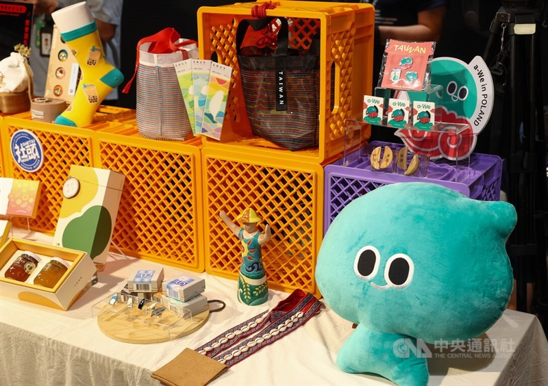 Merchandise featuring Taiwanese IP character a-We and other Taiwanese products are displayed at a press event in Taipei on Monday promoting the National Cultural Association of Taiwan's "2026 Taiwan Day" cultural events in Poland. CNA photo Aug. 31, 2026