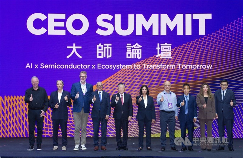 Executives from leading global technology companies pose for a group photo during the SEMICON Taiwan 2026 Masters Forum in Taipei on Wednesday. CNA file photo