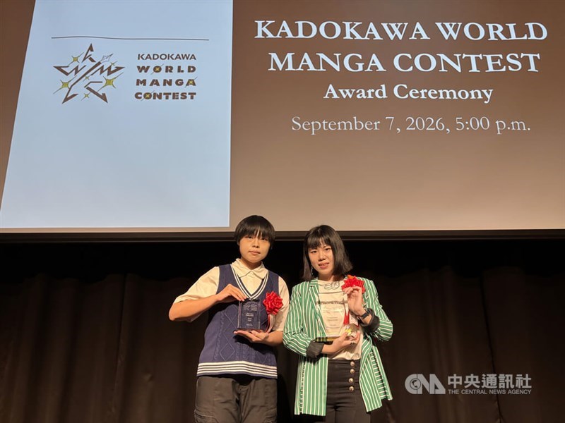 Taiwanese manga creators Eli Lin (right) and MurJi pose with their gold and bronze trophies at the awards ceremony in Tokyo on Monday. CNA photo Sept. 8, 2026