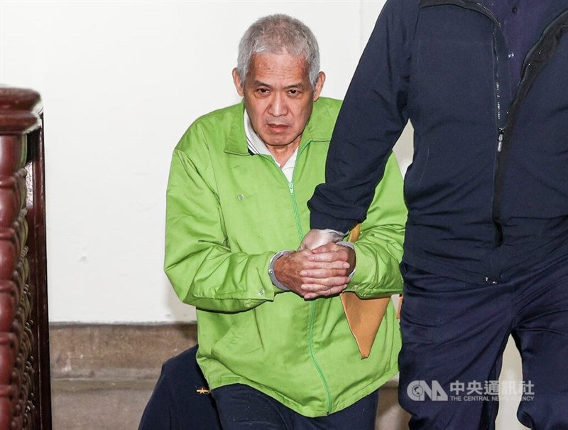 Retired Executive Yuan official Hu Peng-nien (in green jacket). CNA file photo