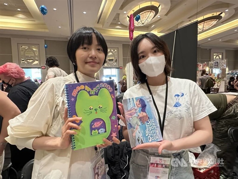 A ee mi, Rio (left) and Monday Recover (right) display their works at the event. CNA photo Sept. 14, 2026