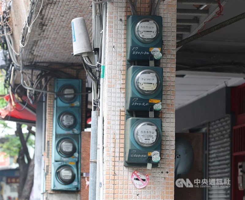 Electricity meters hang from a building's columns in a residential community in Taipei. CNA file photo