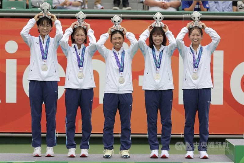 Members of Taiwan's women's soft tennis team at the 2026 Aichi-Nagoya Asian Games pose together for a photo after their silver-medal win. CNA photo Sept. 20, 2026