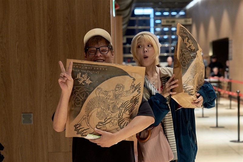 Sunday concert attendees showoff their "tote bags” from the concert. Photo courtesy of Meow Meow International
