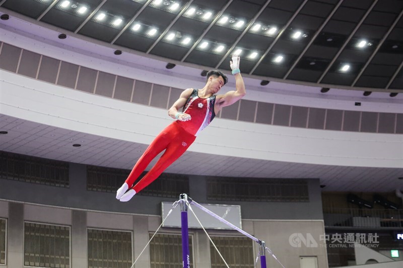 Tang Chia-hung delivers a high-scoring 15.033 on the horizontal bar at the Nagoya Asian Games on Wednesday. CNA photo Sept. 23, 2026