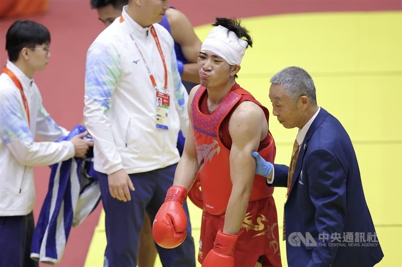Taiwan’s Zhang Huan‑yi takes bronze in the men’s 75‑kg sanda at the 2026 Aichi‑Nagoya Asian Games on Wednesday.