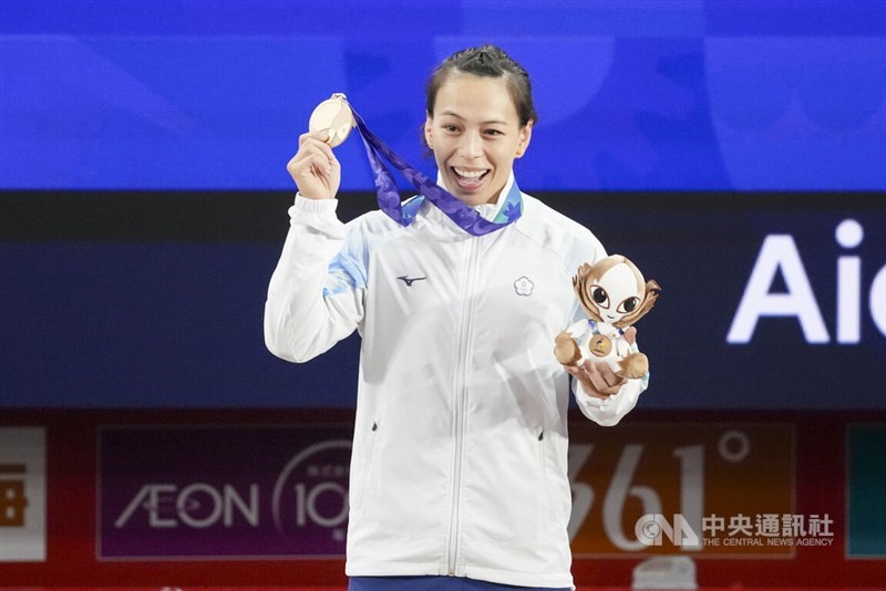 Kuo celebrates his bronze medal win on Friday. CNA photo Sept. 25, 2026