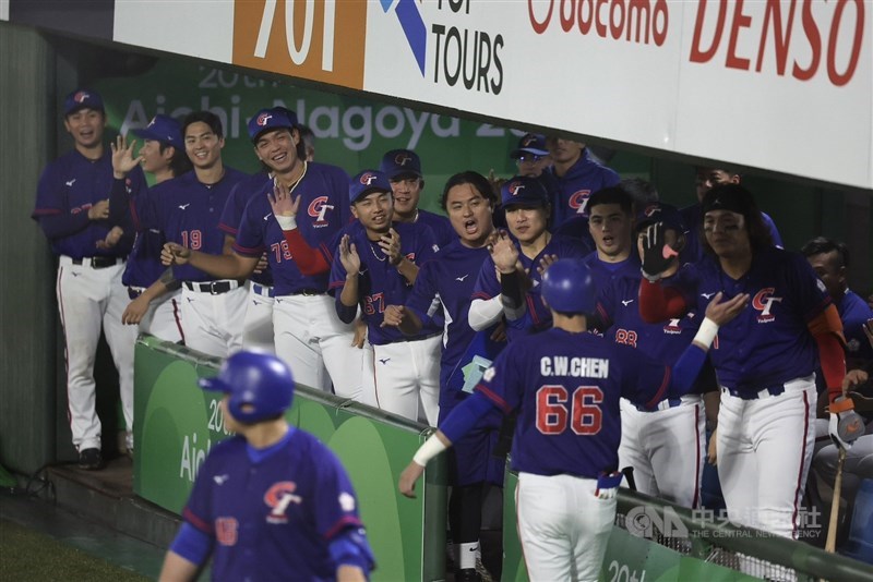 Taiwan's team players celebrate after scoring a run in the seventh inning. CNA photo Sept. 26, 2026
