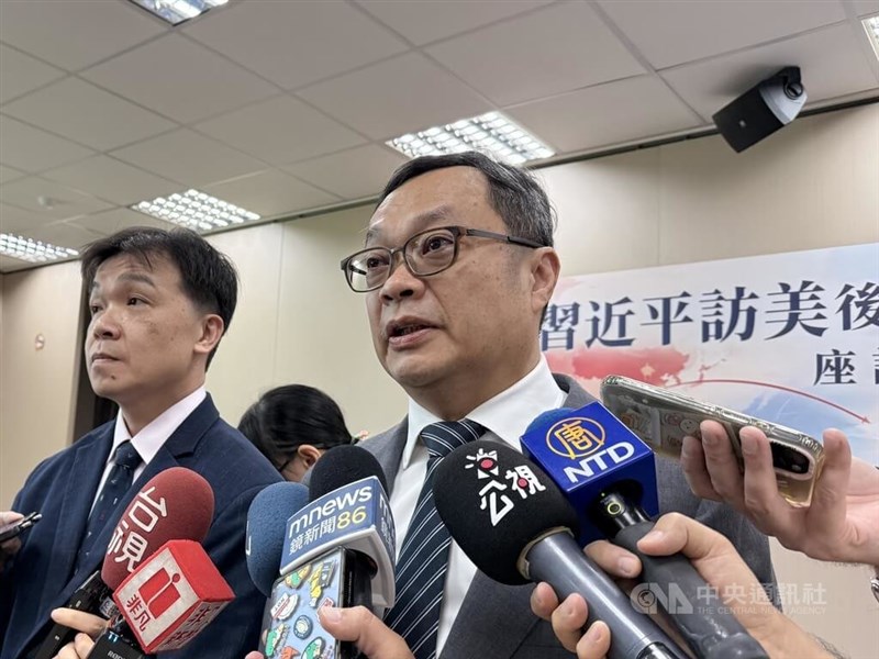 Deputy Foreign Minister Chen Ming-chi (right) speaks to reporters ahead of a seminar in Taipei on Sunday. CNA photo Sept. 27, 2026