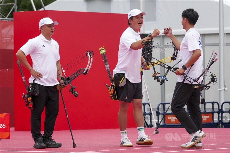 Taiwanese archers fist-bump in celebration after defeating South Korea 234-233 to take compound team bronze at the Nagoya Asian Games on Wednesday. Sept. 30, 2026