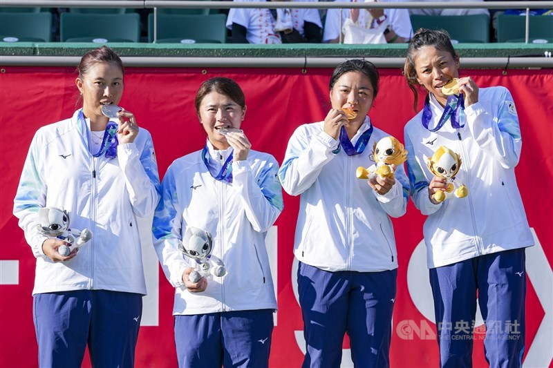 Taiwanese tennis players (from left) Chan Hao-ching and Wu Fang-hsien celebrate their silver medals with gold medalists Liang En-shuo and Hsieh Su-wei at the women's doubles medal ceremony at the Aichi-Nagoya Asian Games on Saturday. CNA photo Oct. 3, 2026