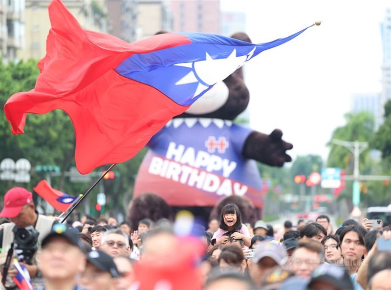 A child bursts into laughter during National Day celebrations in front of Taipei City Hall on Saturday. CNA photo Oct. 10, 2026
