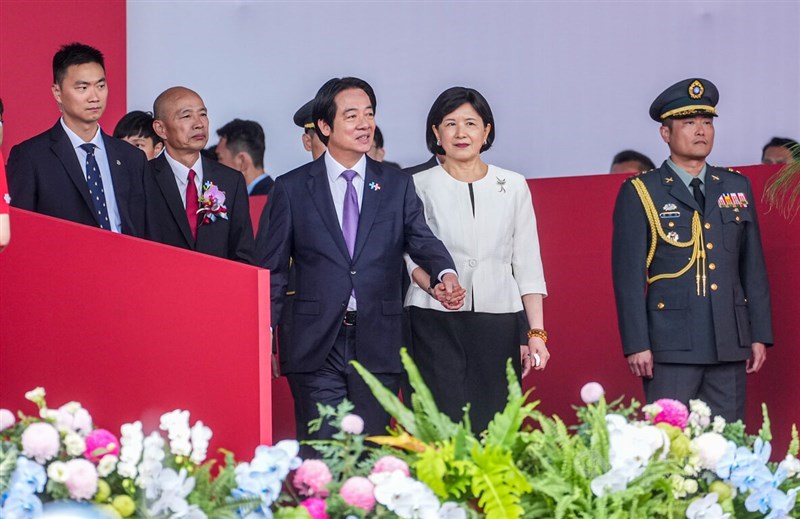 President Lai Ching-te (center) and his wife Wu Mei-ju (second right) step into the venue of the 2026 National Day celebration in Taipei on Saturday. CNA photo Oct. 10, 2026