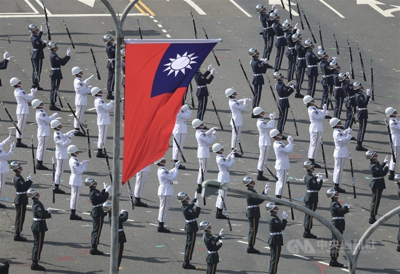 Members of the Republic of China (ROC) honor guard perform rifle drills in front of the Presidential Office in Taipei. CNA photo Oct. 10, 2026.