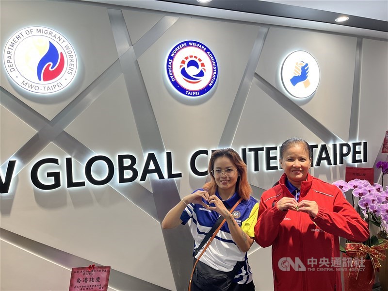 Filipino caregivers Judith Vidal Mendoza (left) and Geraldine G. Domingo pose for a photo at the newly opened OFW Global Center–Taipei on Sunday. CNA photo Oct. 11, 2026