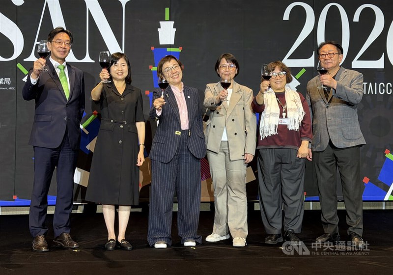 Officials including TAICCA Chairperson Sue Wang (third left) and TAICCA President Wang Min-hui (third right) pose for a group photo at a "Taiwan Night" reception on Monday. CNA photo Oct. 12, 2026