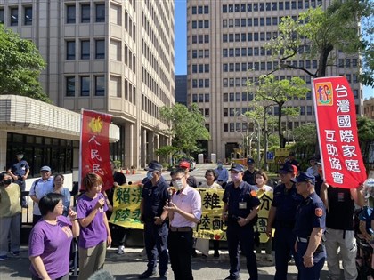 Protesters call for apology as MAC defends Chinese spouse rule