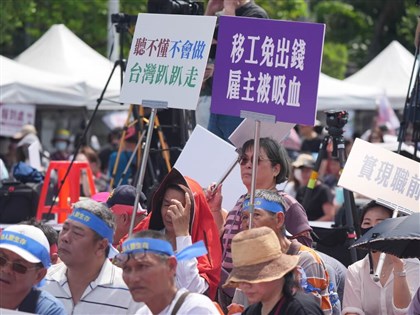 Families hiring migrant caregivers rally for more support, lower fees
