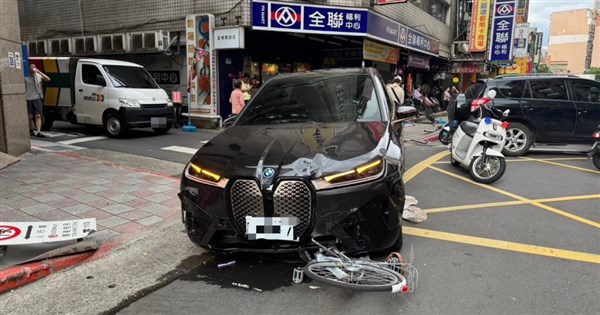 Older driver's BMW EV surges onto Taipei sidewalk, injuring pedestrian