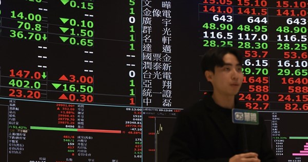 Taiwan shares end at another high, led by TSMC