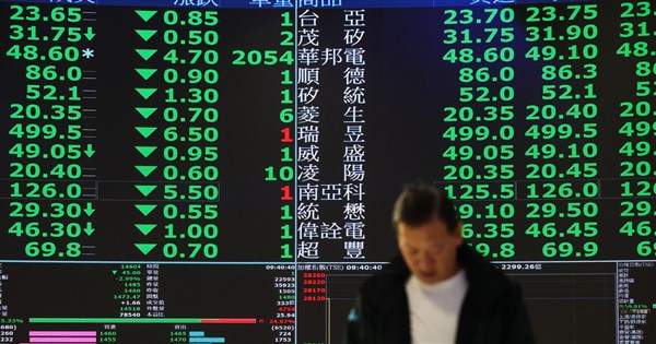 Taiwan shares open lower